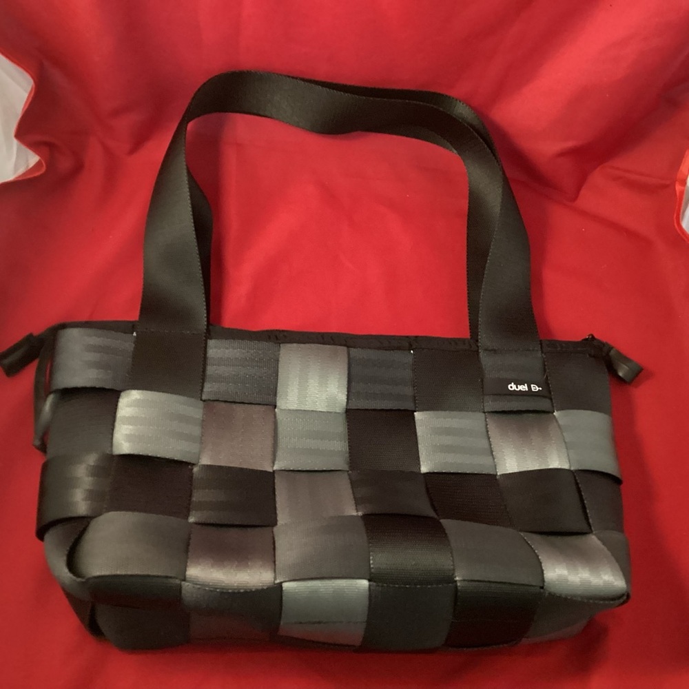 Duel black and grey woven seat belts purse